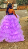 Back view of layered purple tulle overlay skirt with voluminous train