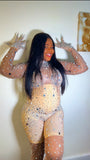 Side angle of nude rhinestone mesh bodysuit showing sculpted fit and sparkle detailing